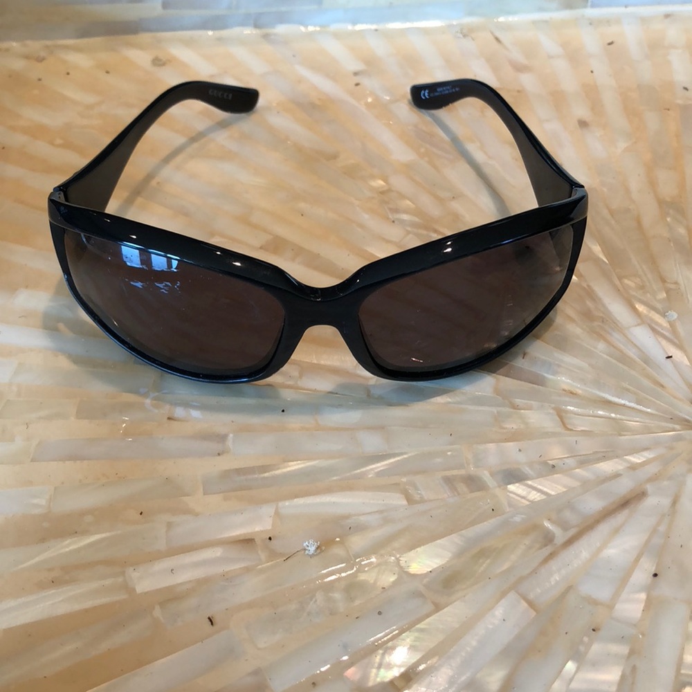 Gucci sunglasses and Gucci case